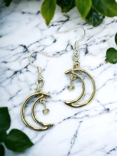 Crescent moon Dreamland Earrings 🌙 Free shipping! The moons have a slight rose gold tone, although they look pretty close to silver as well. They come with silver earring hooks, but I'm happy to add on gold hooks instead! Send me a message & let me know if you have a preference. Crafted with love 💖   Thank you for checking out LunaeLumina!  Feel free to message me if you have any questions! Gold Hooks, Hippy Gifts, Earring Crafts, Earring Hooks, Love Is Free, Silver Earring, Earrings Photo, I'm Happy, Crescent Moon