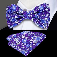 This silk bow tie, adorned with a delicate small floral pattern, comes in shades of green, blue, or red, offering a refined and vibrant accessory for a range of formal and semi-formal occasions. The subtle floral detailing brings a touch of personality while maintaining a classic and elegant feel. Dress Shirts: White dress shirt: A timeless white shirt serves as the perfect canvas for any shade of this floral bow tie, allowing the green, blue, or red hues to stand out while keeping the look cris Elegant Summer Bow For Gifts, Elegant Spring Bow Tie With Butterfly Knot, Elegant Bow Tie Suit Accessories For Spring, Elegant Bow Tie Suit And Tie Accessories For Spring, Elegant Floral Print Accessories For Black Tie, Elegant Multicolor Bow Tie, Elegant Blue Bow Tie For Spring, Elegant Spring Bow With Ties, Elegant Bow Tie For Spring Gifts