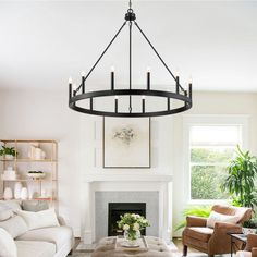 This 12-light large Candle style chandelier features durable wrought iron and hand-painted black finish.Its clean silhouette pairing classic Wagon Wheel shape makes it a refined chandelier light fixture which blends in multiple styles from traditional,… Black Wagon Wheel Chandelier, Industrial Style Decor, Black Candle, Wheel Chandelier, Large Candle, Black Industrial, Wagon Wheel Chandelier, Candle Style Chandelier, Large Candles