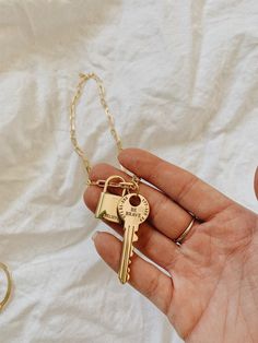 This beautiful lock and key set comes together but can be separated or kept together, the key has a set of numbers and the phrase 'BE BRAVE' and the lock as the word 'BELIEVE' printed on itThe dainty link chain is 18 inches long I personally source and assemble all my Jewelry Pieces with love in Miami Florida XOXO 18k Gold Filled Chain All of our jewelry is 100% hypoallergenic, Lead & Nickel Free. Those with allergies do not need to worry about developing an allergic reaction. My standard sh Gold Jewelry With Lobster Clasp For Birthday, Key Necklace Gold, Lock And Key Necklace, Gold Key Necklace, Chain Necklace Gold, Gold Key, Lock Set, Key To My Heart, Key Lock