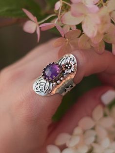 This magical shield ring was designed to protect you from evil and make you feel confident and happy in your skin. Entirely handcrafted in sterling silver, this ring features a lovely faceted amethyst gemstone and handmade embellishments. Size 6.5, but due to its wide band, the ring will comfortably fit size 6. You can see how this ring was made in this video: ➥ All Stardust Mine products are made by hand of a real person and not machine, using precious and semi-precious metals and natural stone Silver Amethyst Ring In Mystical Style, Mystical Sterling Silver Amethyst Ring, Bohemian Sterling Silver Jewelry With Accent Stones, Spiritual Sterling Silver Rings With Accent Stones, Bohemian Sterling Silver Butterfly Ring, Mystical Amethyst Ring In Sterling Silver, Mystical Sterling Silver Rings In Purple, Spiritual Silver Amethyst Ring In Sterling Silver, Mystical Sterling Silver Purple Rings