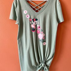 Shirt Was Purchased At Disney During The Festival. Never Worn, Only Tried On. Was Too Small When I Bought It, Now I Lost Weight And It’s Too Big. Mint Green Color With Beautiful Pink Flower Details. Size Xl Cute V-neck T-shirt For Spring, Cute Green Spring Shirt, Disney Green T-shirt With Crew Neck, Disney Green Crew Neck T-shirt, Green Disney Cotton T-shirt, Pink Disney Short Sleeve T-shirt, Cheap Disney Short Sleeve T-shirt, Beautiful Pink Flowers, Festival Shirts