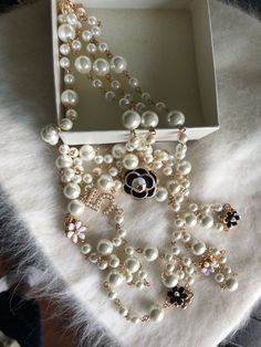 The perfect addition to any outfit! With black crystal pendants, pearls, and gold and silver alloys, this necklace looks good with everything. #pinkgolddesign #sophisticateddesign #sophisticatedchic #sophisticatedlady #sleekandsophisticated #giftsforexecutives #colleaguegifts #motherinlawgifts #giftsformillenials #jeweled #ladyluxury #luxurybrands #luxuryshopping #wealthylifestyleluxury #lifeluxury #youareaqueen #queen #beaqueen #imaqueen #iamaqueen #iamqueen #iamthequeen #queengifts #hisqueen Elegant Pearl Necklace With Chain For Wedding, Elegant Wedding Pearl Necklace With Chain, Chic Pearl White Pearl Necklace For Party, Chic Pearl White Necklace For Party, Chic Pearl Drop Necklace For Party, Elegant Pearl Necklace With Chain, Chic Pearl-embellished Pearl White Jewelry, Elegant Pearl Necklace With Chain For Formal Occasions, Elegant Pearl Necklace With Chain For Evening