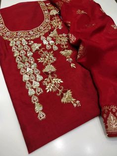 Item Overview ATHARVA Hand Embroidered Salwar Kameez in Red w/Beautiful Embroidered Neck/Beautiful Banarsi Minakari Silk Maroon Dupatta/Customized Stitching/ Wedding/Bridal Trousseau Dno. CH1702 Fabric: * Shirt: Chanderi - Reds- 2.5 Mts, with Beautiful Embroidery Neck * Dupatta: Minakari Banarsi Silk Dupatta (Motifs may wary) * Salwar: Santoon Silk 2.5 Mts. (Doesn't require lining in stitching) Excusive Hand Embroidered Party Wear Punjabi Suit. Customization: * Fabrics Customization: Designs Can Yoke Designs, Maroon Dupatta, Red Longsleeve, Patiala Salwar Kameez, Stitch Wedding, Embroidered Suits, Bridal Trousseau, Embroidered Salwar, Ladies Suit