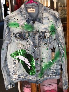 Denim jacket hand painted in green and black size in medium in men but is decorated for a woman. Jacket Hand Painted, Womens Jackets, Camo Jacket, Green And Black, Camo, Denim Jacket, A Woman, Art Collection, Jackets For Women