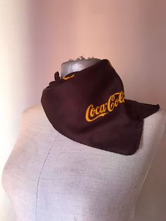 "Super rare advertising brown/orange Coca Cola squared neck scarf, featuring the classic logo and orange can prints. I guess that you have never seen a chocolate brown scarf from the Coke company before and that you have never heard that there were a scarf made by the well-known Italian (more specifically from Como lake) scarf factory of Gentilucci Really, how cool is that? There is also the small golden embossed date clamp label of the Italian designer that certifies it! The date of production Vintage Square Scarf Gift, Vintage Square Scarves For Gift, Vintage Square Scarves As Gifts, Vintage Square Scarves As Gift, Vintage Rectangular Scarves For Gift, Vintage Scarves As Gift, Como Lake, Brown Scarf, Brown Scarves