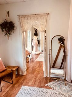 a mirror sitting on top of a hard wood floor