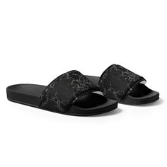 Introducing our Black Granite Men's Slides, a stylish and versatile footwear option for the modern man. Crafted with a sleek black granite design, these slides offer a contemporary and sophisticated look. Perfect for casual outings or relaxing by the pool, these slides provide comfort and effortless style all day long. Men's Slides Product Details: • Strap Comfort: Features a cushioned faux leather upper strap for a gentle touch against the skin. • Lightweight Sole: Built with a polyurethane (PU Black Modern Slip-on Slides, Modern Black Slippers With Textured Sole, Modern Black Slip-on Slippers, Modern Black Flip Flops With Textured Footbed, Modern Black Slip-on Flip Flops, Black Summer Slides With Textured Sole, Modern Black Slip-on Slides, Modern Black Synthetic Slippers, Modern Black Slides With Rubber Sole