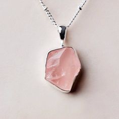 Fulfilled by our friends at Tiny RitualsFill your cup of love with the raw Rose Quartz Necklace. Celebrated in the crystal guide as being the ultimate heart chakra crystal, this pretty pink crystal is here to crack you open and nurture compassion, gentle communication, and dreamily deep bonds. “With this necklace, I nurture loving compassion with myself and those around me.” Description Rose Quartz is one of the most popular crystals out there - from gemstone bracelets to zodiac bracelets, palm Delicate Pink Gemstone Crystal Necklace, Pink Spiritual Crystal Gemstone Necklace, Spiritual Pink Gemstone Crystal Necklace, Pink Spiritual Gemstone Crystal Necklace, Pink Quartz Jewelry As A Gift, Pink Quartz Jewelry As Gift, Pink Quartz Jewelry Gift, Pink Quartz Jewelry For Gift, Pink Quartz Jewelry For Gifts