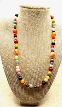 OMJN401 Mixed Natural Gemstones Necklace Length 19 inches $29 Mixed Natural Gemstone Round Beads, with all the colors in a Rainbow. This necklace is one of our most popular creations. This is a nice, middle of the chest length necklace with soo much color. Natural Coral, Quartz, Jasper, Citrine, Turquoise and much more.  Our gemstones are guaranteed Natural & Undyed. We only use the best and strongest construction techniques. Natural Gemstones are a good investment. They will always gain in value as time goes by. Construction Techniques, Natural Gemstone Necklace, Length Necklace, Natural Coral, Necklace Length, Gemstone Necklace, Round Beads, Crystal Necklace, Citrine