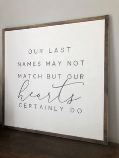 a sign that says our last names may not match but our hearts certainly do