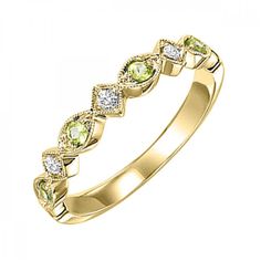 Make a fashion statement with this stackable eye-catching 10K White, Yellow or Rose Gold 0.10CTW Diamond & 0.13CTW Peridot ring. Wearing just one ring, or several, mix the metals or the gemstone colors, the combinations are endless! Peridot Ring, Rings Wedding, One Ring, 10k Gold, Gemstone Colors, Diamond Shapes, Or Rose, Fashion Rings, Diamond Bracelet