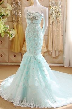 Ice Blue Lace Appliquéd and Beaded Embellished Fitted Blue Wedding Dress For Debutante Ball, Embellished Mermaid Gown For Prom Season, Blue Mermaid Gown For Prom Season, Blue Mermaid Gown For Prom, Blue Floor-length Mermaid Dress For Wedding, Blue Floor-length Mermaid Wedding Dress, Embellished Mermaid Prom Dress, Blue Embellished Mermaid Wedding Dress, Blue Mermaid Gown With Sequins