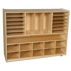 a large wooden shelf with many compartments