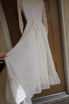 "Size 7 Gunne Sax prairie dress fits smaller - please see measurements. Zips in the back with adjustable tie at the back of the waist. In very good condition!. Measurements taken across front lying flat 15\" across front armpit to armpit 12.5\" across front of waist (ties tighter) 55\" length" Fitted Vintage White Prairie Dress, Vintage Long Sleeve Prairie Dress With Lace Trim, Vintage Prairie Dress With Lace Trim, Vintage White Prairie Dress With Lace Trim, White Ruffled Vintage Prairie Dress, Vintage Halter Dress, Bathing Suit Dress, Prairie Dress, Lace Maxi