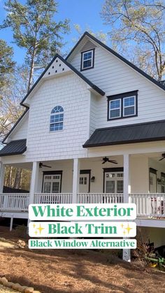 a white house with black trim and the words white exterior on it's front porch