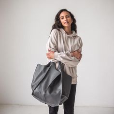 This handmade women tote bag is produced of Italian very soft  leather. It has one large compartment and has one pocket - inside. This bag is simple, reliable, and durable. Its universal look allows to use the bag for various purposes. One may take the bag to the work, shopping, meeting, or walk and feel comfortable with it at any conditions.SIze and Dimensions:Large:Height: 16.14 inches  (41 cm)Width: 12.2 inches  (31 cm) Depth: 10.2 inches  (26 cm)Inside pocket:Height: 12.2 inches  (31 cm) Wid Leather Hobo Bag For Everyday Fall Use, Casual Leather Hobo Tote Bag, Fall Leather Hobo Bag, Fall Everyday Large Capacity Hobo Bag, Everyday Tote Shoulder Bag With Soft Interior, Everyday Fall Tote Hobo Bag, Leather Hobo Tote Bag For Fall, Versatile Everyday Hobo Bag With Rolled Handles, Fall Leather Hobo Bag Shaped As Tote