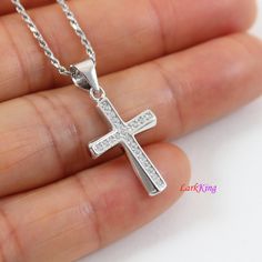 "Sterling silver cross necklace, small cross necklace, unique thick cross pendant, religious necklace, gift for Christian, gift for Baptism, christian jewelry, first communion gift. Cross pendant: Solid 925 sterling silver with cubic zirconia crystal, white gold plating Pendant size: 1/2\"x 3/4\" Pendant weight: 1.4 g Chain: white gold plating solid 925 sterling silver; high quality unique chains; see images above. To select Sterling Silver Chain Style and Length from a drop down menu: Figaro ch Sterling Silver Cross Pendant Necklace For First Communion, Sterling Silver Cross Necklace For First Communion, Sterling Silver Cross Necklace For Baptism, Silver Cross Necklace For Baptism, White Cross Necklace For First Communion, White Cross Necklace For Baptism, White Cross Pendant Necklace For Baptism, Baptism Christian, Small Cross Necklace