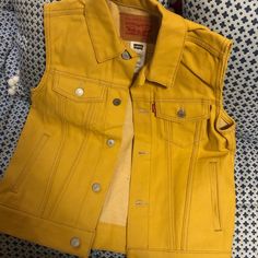 Brand New Levi’s Yellow Denim Marked M 10-12 (Youth) But Could Fit A Women’s 4 Great Over A Shirt With Jeans And Sneakers Or Sweater With A Maxi Skirt Or A Long Sleeve Dress With Riding Boots For Fall. Casual Mustard Cotton Outerwear, Fitted Yellow Denim Jacket For Fall, Yellow Cotton Denim Jacket For Fall, Yellow Denim Jacket With Pockets For Fall, Casual Yellow Denim Jacket With Pockets, Yellow Cotton Denim Jacket With Pockets, Casual Yellow Denim Jacket, Dress With Riding Boots, Shirt With Jeans