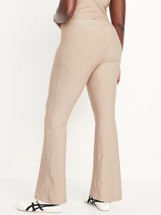 hidden front pocket go-dry wicks moisture extra high waist is 1" higher than standard high rise sits above belly button fitted hip and thigh hits below ankle 31 1/2" regular inseam 29 1/2" petite inseam 35 1/2" tall inseam models are approx.  5'9" and wear sizes s (4), l (12), and xl (18)machine wash according to the care instruction label Beige Leggings, Outfit References, Flare Leggings, Petite Size, Wicks, Belly Button, Toddler Boys, Front Pocket, Old Navy