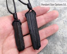 Beautiful handmade raw Black Tourmaline stone pendant, with an adjustable black necklace cord. Black Tourmaline is a powerful protection amulet, EMF protection, balancing, and grounding stone and therefore can bring these qualities to the wearer. This necklace is a unique creation that will shine out the uniqueness in you. It can be a great gift for your loved man or yourself! *'¨) ¸.*'¸.**'¨) ¸. (¸.*' (¸.*` ♥ *FREE INTERNATIONAL SHIPPING ►►You will receive one stone pendant that has been chosen Handmade Black Necklace For Personal Use, Handmade Black Jewelry For Personal Use, Handmade Black Necklace, Handmade Black Necklaces, Adjustable Black Amulet Necklace, Black Jewelry With Adjustable Cord For Healing, Black Spiritual Necklace With Adjustable Length, Black Necklace With Adjustable Cord As Gift, Birthday Gift For Boyfriend