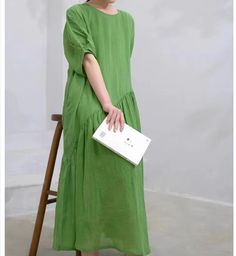 Made from high-quality ramie, this dress is breathable and comfortable for summer. The unique asymmetric design adds an artistic flair to your wardrobe. Loose fit for a relaxed and casual look, perfect for everyday wear. Available in a fresh green color that adds vibrancy to any outfit. Material:washe soft Linen 150g/m Mid-wightwe custom made any size.Here is the size chart for your kind conference: S: Size: Bust:104cm/40.9" length 118cm/47.2" M: Size: Bust:108cm/42.5" length 118cm/47.2" L: Size: Bust:114cm/44.8" length 118cm/47.2" XL: Size: Bust:120cm/47.2"" length 118cm/46.5" Measuring Method: Click to view the measurement method Shipping: we ship worldwide the USPS takes about 10-15 days if you want a express shipping,please contact with us Payment: we accept payment by PayPal and credi Casual Green Midi Dress With Asymmetrical Hem, Green Casual Maxi Linen Dress, Casual Linen Dress With Asymmetrical Hem, Casual Green Maxi Linen Dress, Casual Green Linen Maxi Dress, Linen Dress Summer, Shirt Blouses Women's, Wool Coat Women, Summer Linen Dresses