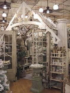 the inside of a store filled with lots of christmas decorations