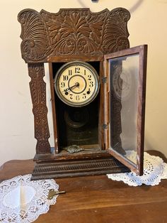 Antique E. Ingraham Wind Up Ornate Pendulum Gingerbread Rooster Alarm Mantel Clock  Circa: Late 1800's  Manufactured By: E. Ingraham Co. Bristol, Conn, U.S.A.  Commonly referred to as a gingerbread or rooster clock. Phenomenal highly decorative scroll wood work Is very ornate and in beautiful antique condition.  Comes with original ornate pendulum featuring a castle scene and winding key.  Would look fantastic on a fire place mantel! Pendulum works, winding works and till has a beautiful deep chime sound. Appox 23 in H & 14 in W & 4.5 in Deep Condition: This Clock Is In Beautiful Antique Condition but shows signs of wear and scratches/knicks due to use and age. Aurora Borealis Crystal, Antique Clock, A Castle, Wood Work, Cream And Sugar, Fireplace Mantels, Mantel Clock, A Fire, Plate Sets