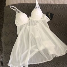 Size Small White Seductivewear Lingerie, Never Worn, Was A Gift And Had Two Of Exact Same, Neither Had Receipt To Return. Lace Trim, Built In Padded Bra. Tags Still On. White Lingerie Dress, White Lingerie, Lingerie Dress, Padded Bra, Women's Intimates, Lace Trim, Colorful Dresses, Built In, Color White