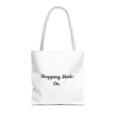 Elevate your everyday style with our custom-printed "Shopping Mode: On" design tote bags, available in two versatile sizes. Crafted from 100% spun polyester, these bags are designed for durability and high-end visual appeal. Featuring double-stitched seams, cotton webbing straps, and a nonwoven laminate lining, they ensure lasting quality. With five color handle options to complement your unique design, each tote bag offers a spacious storage compartment, perfect for carrying all your essentials Trendy White Reusable Bags, Trendy Rectangular Canvas Shopping Bag, Casual Shopping Bag With Letter Print, Letter Print Tote Bag For Shopping, Rectangular Letter Print Bags For Shopping, Letter Print Shopping Bags, Trendy Shoulder Bag With Letter Print For Shopping, Trendy Shopping Shoulder Bag With Letter Print, Casual Customizable Shopping Bag