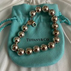 Sterling Silver, Size Medium, 7.5" Long, 10 Mm Diameter. Cleaned At Tiffany’s And Barely Ever Worn. Jewelry Tiffany, Ball Bracelet, Tiffany Co Jewelry, Tiffany & Co., Womens Jewelry Bracelets, Women Jewelry, Size Medium, Bracelet, Sterling Silver