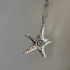 𝔇𝔢𝔱𝔞𝔦𝔩𝔰: Shape\pattern: Starfish Material: Metal Quantity: 1pc Length 45cm Style: Goth, Punk, Cyberpunk Featured with its starfish pendant & futuristic vibe Solid, durable material with a perfect sheer surface Exquisite craft, a very good gift choice Enjoy free shipping with a purchase of over 80$ Metal Starfish Charm Jewelry, Silver Star-shaped Metal Necklace, Silver Star-shaped Alloy Jewelry, Starfish Charm Metal Necklace For Gift, Metal Necklace With Starfish Charm For Gift, Silver Adjustable Starfish Necklace, Adjustable Silver Starfish Necklace, Punk Cyberpunk, Sweater Necklace