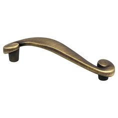 an antique brass pull handle on a white background