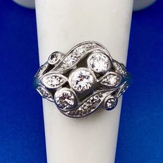 * Art Nouveau Art Deco Platinum Diamond Floral Cluster Engagement Cocktail Ring * Ring Size: 5.00 * Top of ring measures: 5/8" x 3/4" * Round Diamond carat weight: approximately .50 tcw * Diamond color: H-I * Diamond clarity: SI * Weight: 6.0 tgw * Marked: makers marks 50 plat * Condition: Great * Item will be shipped via Register Mail will being video surveilled with a Notary Public and two witnesses.  * (G54)    Exported By ExportYourStore :) Dazzling Multi-stone Platinum Diamond Ring, Platinum Cluster Multi-stone Diamond Ring, Platinum Multi-stone Cluster Diamond Ring, Diamond White Multi-stone Ring For Formal Occasions, Art Deco Multi-stone Platinum Diamond Ring, Round Multi-stone Platinum Diamond Ring, Luxury Multi-stone Diamond Cluster Ring, Diamond White Multi-stone Oval Diamond Ring, Luxury Multi-stone Cluster Diamond Ring