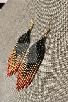 Colors: Black , Gold and Red Orange And Black Beads Dangle Earrings, Orange Dangle Beaded Earrings With Black Beads, Orange Dangle Earrings With Black Beads, Black Beaded Teardrop Earrings For Gift, Teardrop Black Beaded Earrings As Gift, Teardrop Black Beaded Earrings For Gift, Teardrop Earrings With Black Beads For Gifts, Orange Earrings With Black Beads As Gift, Orange Earrings With Black Beads For Gift