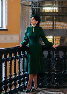 Fitted Long Sleeve A-line Dress For Winter, Fitted A-line Long Sleeve Winter Dress, Green A-line Winter Dress, Fitted Wool Long Sleeve Dress, Fitted Wool Dress With Long Sleeves, Fitted Long Sleeve Dark Green Midi Dress, Dark Green Fitted Long Sleeve Dress, Dark Green Fitted Long Sleeve Midi Dress, Fitted Dark Green Long Sleeve Midi Dress