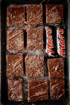 Mars bar slices on a baking sheet with two small Mars bars. Mars Bar Slice, Coco Pops, Mini Meringues, Cake Stall, Slice Recipe, Mars Bar, Australian Food, Recipe Sweet, Slices Recipes