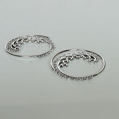 A PAIR of sterling silver Indian style spiral hoops. Dimensions: 27 mm Weight: 3.5 gm These earrings are made of 925 hypoallergenic sterling silver. All my pieces are sent in a gift box. I can include a personal message from you if needed. You are welcome to contact me at... bhavnakwintra1956@gmail.com More hoops: https://www.etsy.com/your/shops/TheSilverGame/tools/listings/section:26305414 More earrings: https://www.etsy.com/your/shops/TheSilverGame/tools/listings/section:26308789 Ear climbers: Hoops Silver, Ear Climbers, Indian Style, Silver Gifts, Ear Wire, Ear Wires, Indian Fashion, Thailand, Silver Rings