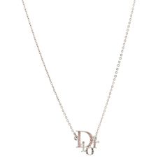 This is an authentic CHRISTIAN DIOR Metal Crystal Logo Choker Necklace in Silver and Pink. The exquisite detail and charm of this Christian Dior necklace make this an ideal piece for your collection. The necklace features a Dior pendant in silver-tone framed with pink crystals. Dior Pendant, Christian Dior Necklace, Choker Necklace Silver, Dior Necklace, Crystal Logo, Pink Crystal, Necklace Silver, Silver Necklaces, Christian Dior