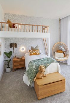 a child's bedroom with bunk beds and toys