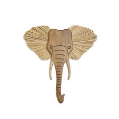 an elephant head made out of wood on a white background