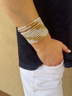 Paula Rosen Gold and Pearl Coil Bracelet Elegant Beaded Wrap Bracelet As Gift, Elegant Gold Bangle Bracelet With Beads, Elegant Gold Bead Bangle, Elegant Gold Wrap Bracelet With Gold Beads, Gold Pearl Jubilee Bracelet, Elegant Gold Bangle With Round Beads, Elegant Gold Beaded Bangle, Luxury White Beaded Pearl Bracelet, Elegant White Pearl Bangle