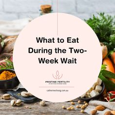 the words what to eat during the two - week wait are surrounded by various fruits and vegetables