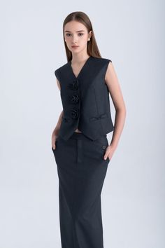 Upgrade your wardrobe with our luxurious vest. Made with high-quality polycotton material, this vest features a modern and flattering straight v-neck design. Elevate your style effortlessly with this versatile and sophisticated piece. Fitted V-neck Vest For Office, Elegant V-neck Vest For Formal Occasions, Classic V-neck Office Vest, Elegant Sleeveless Vest For Office Wear, Elegant Tailored Vest For Office Wear, Elegant Sleeveless Vest For Business Casual, Elegant V-neck Vest For Office Wear, Semi-formal Sleeveless Top For Spring, Sleeveless Semi-formal Spring Top