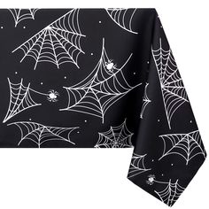 a table cloth with spider webs on it