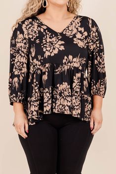 Elevate your wardrobe with this blouse! Its elegant babydoll style and flattering v-neck make it a must-have for any occasion! The delicate floral print in neutral colors adds a touch of sophistication, making it both stylish and versatile! 95% Polyester, 5% Spandex Feminine V-neck Printed Blouse, Flowy V-neck Blouse With Floral Print, Elegant Fall V-neck Peplum Top, Fall Elegant V-neck Peplum Top, Elegant V-neck Peplum Top For Fall, Chic V-neck Floral Print Top, Elegant Floral Print V-neck Top, Elegant V-neck Floral Print Tops, Spring Elegant V-neck Peplum Top