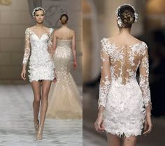 the back of a white wedding dress with long sleeves and sheer laces on it