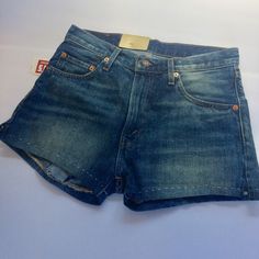 Nwt Levis Vintage 505 Shorts Sz 27 This "Summer Of Love" 1967 505 Is The Classic Slim-Fitting Jean Of The 1960'scut Slim And Straight. It Has A Lower Rise (Vs 501s) And Zipper Fly. This Garment Is Made With Selvedge Denim And Features The Big "E" Red Tab. Remaining Faithful To The Original, It Also Included A Talon Zipper The Original Zipper, Manufactured Since 1893. This Pair Has Been Customized Into Shorts With A Pick Stitch Hem And Side Slits. Measurements Coming Soon Classic High Rise Blue Shorts, Classic High-rise Blue Shorts, Classic High Waist Jean Shorts For Summer, Classic Short Leg Summer Jeans, Classic High-waisted Jean Shorts For Summer, Vintage Levi's Jean Shorts, Retro Blue Cutoff Shorts, Vintage Mid-rise Fitted Shorts, Classic Blue Jean Shorts For Summer