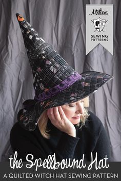 a woman wearing a witch's hat with the words, the spellbound hat