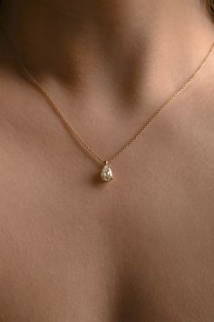 A drop of afternoon sun, captured within a glowing heirloom that gently rests on your collarbone. A truly one of a kind diamond and necklace—once sold, we will not be able to recreate this! 14k yellow gold1.07ct antique champagne pear diamond (a genuine heirloom!)Light champagne, SI1-VS2 eye clean 16-18” adjustable chain Good Pendant Necklace, Gold Chain Diamond Pendant, Pear Drop Necklace, Champagne Gold Accessories, Pear Pendant Necklace, Prom Jewlrey Looks Gold, Pear Shaped Necklace, Champagne Gold Jewelry, Light Gold Jewelry